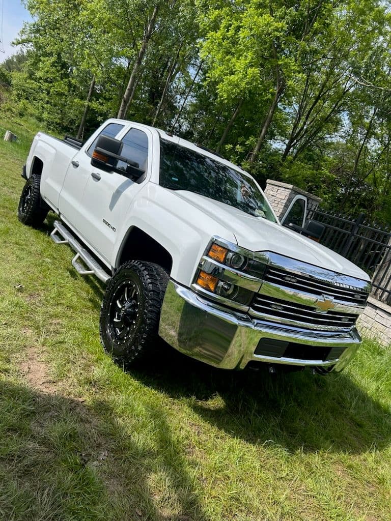 Sleek White Truck Shines with Clay and Seal Care